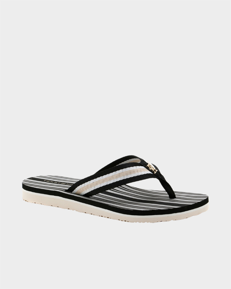 כפכפי אצבע טומי הילפיגר לנשים בגוון שחור בז'